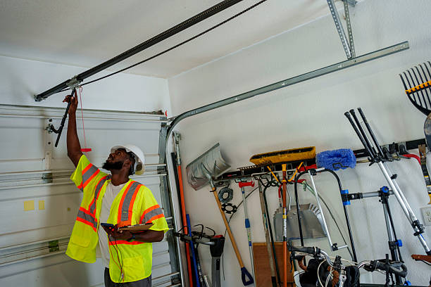 Professional Garage Door Installation technician working in Shinnecock Hills, NY